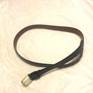 Coach men’s belt Fits 36”- 40”. The leather is 42”